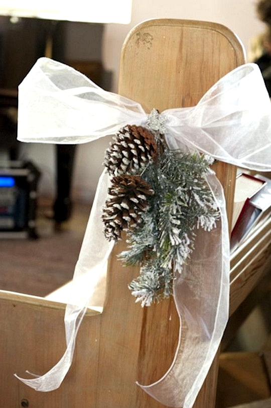 Pinecone and fir winter wedding aisle decor