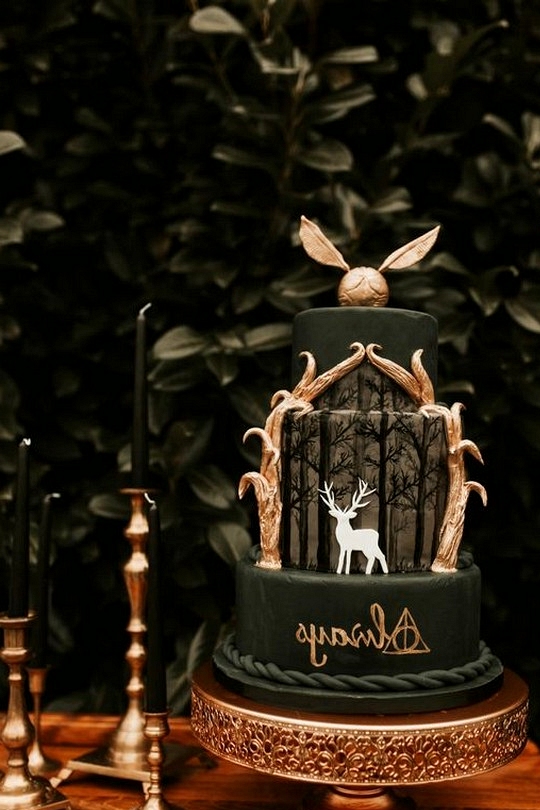 Moody emerald greena and gold harry potter themed wedding cake