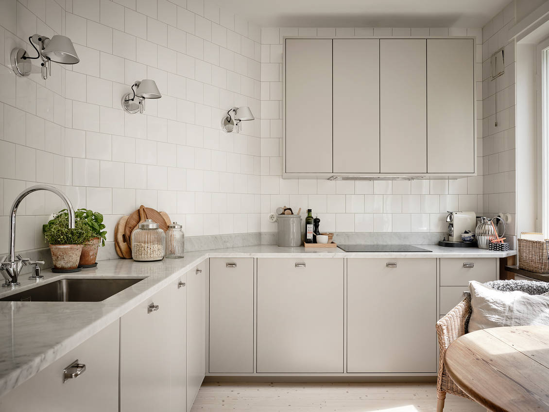 Minimal but cozy beige kitchen