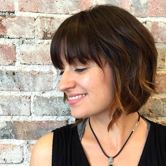 Pretty short bob hairstyle with bangs for women
