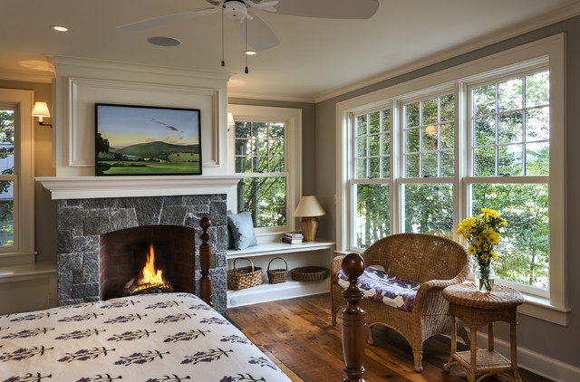 traditional-bedroom-fireplace-near-windowsill