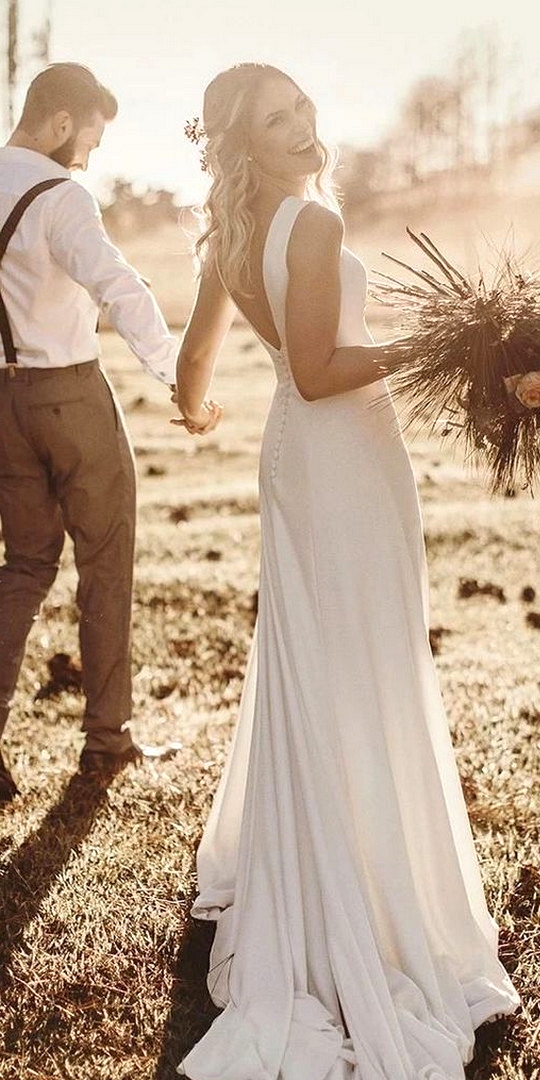 simple elegant wedding dress with v back