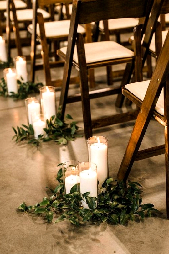 chic rustic wedding aisle decoration ideas with greenery and candles