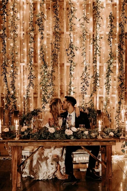 string lights and greenery wedding backdrop ideas