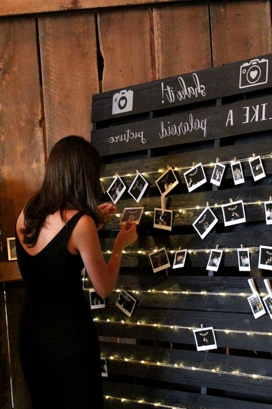 rustic barn wedding photo display ideas with string lights