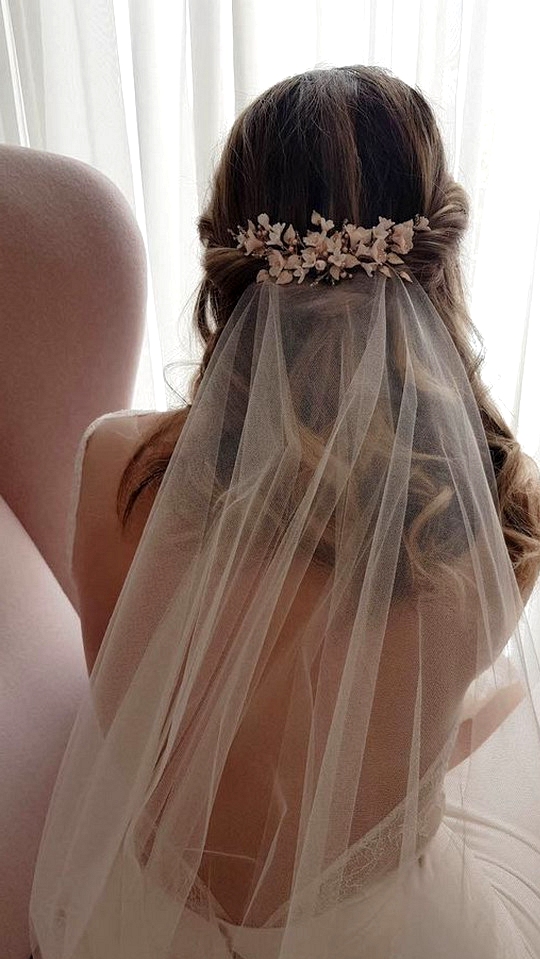 half up half down wedding hairstyle with veil