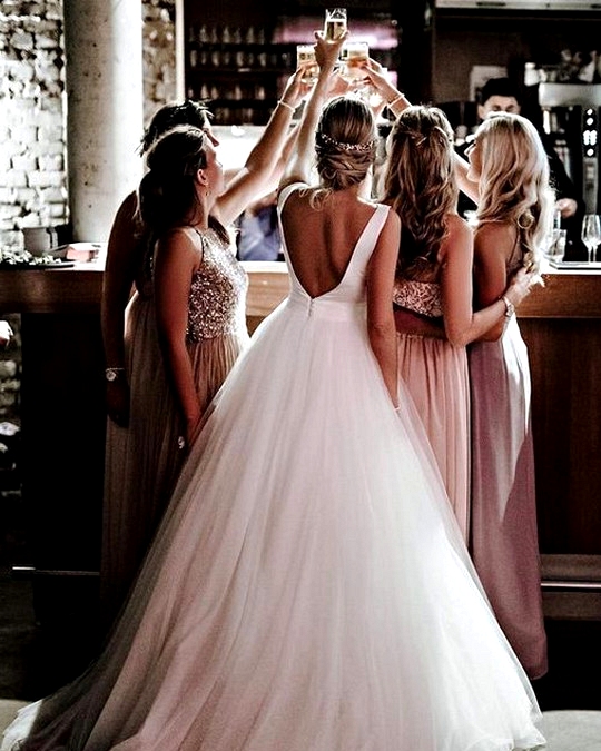 creative wedding photo with bridesmaids
