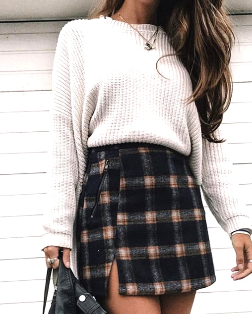 cozy-new-years-eve-outfit-ideas-check-skirt-white-sweater-min