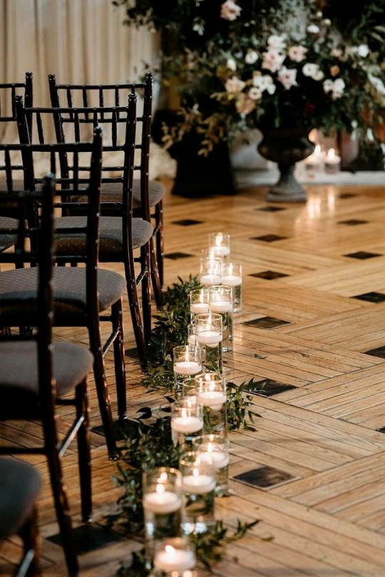 wedding aisle ideas with candles and greenery