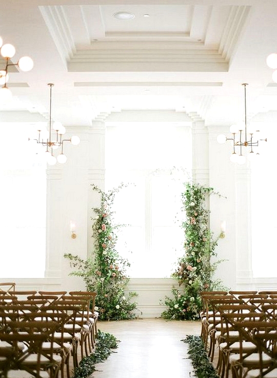 chic simple indoor wedding ceremony ideas with floral backdrop