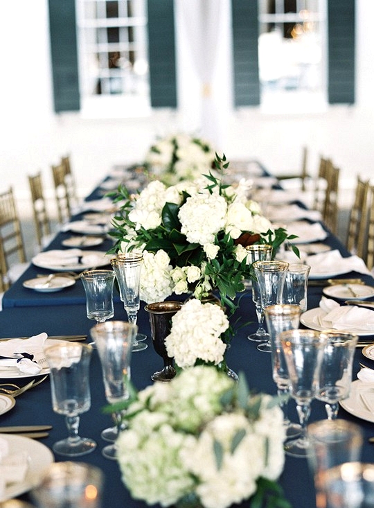 navy blue gold and greenery long table wedding decorations