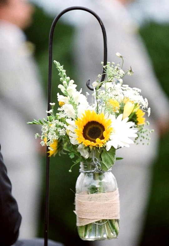 chic wedding aisle decorations with mason jars and sunflowers