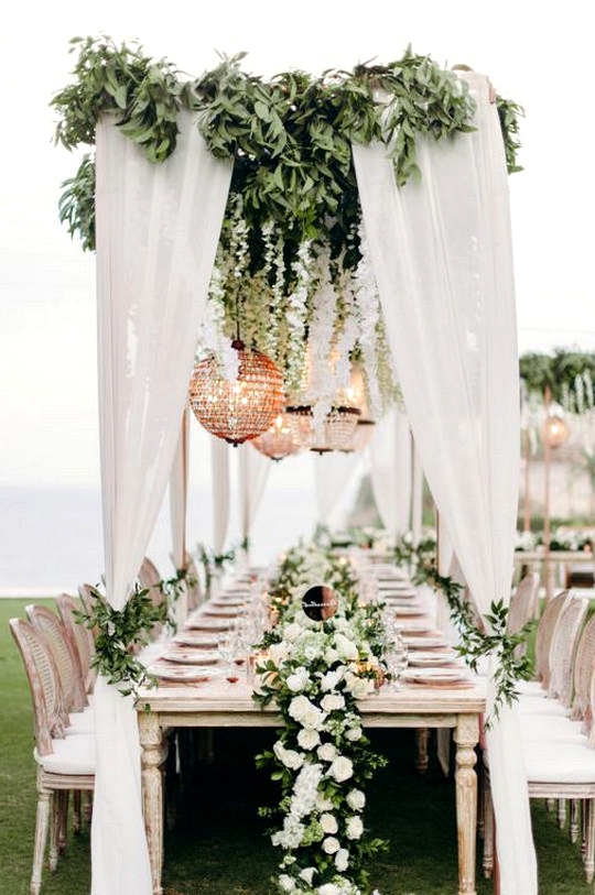 stunning white and greenery beach wedding reception