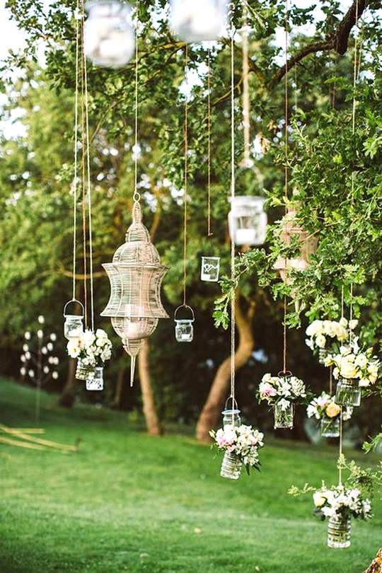 outdoor wedding decoration ideas with hanging cans and jars