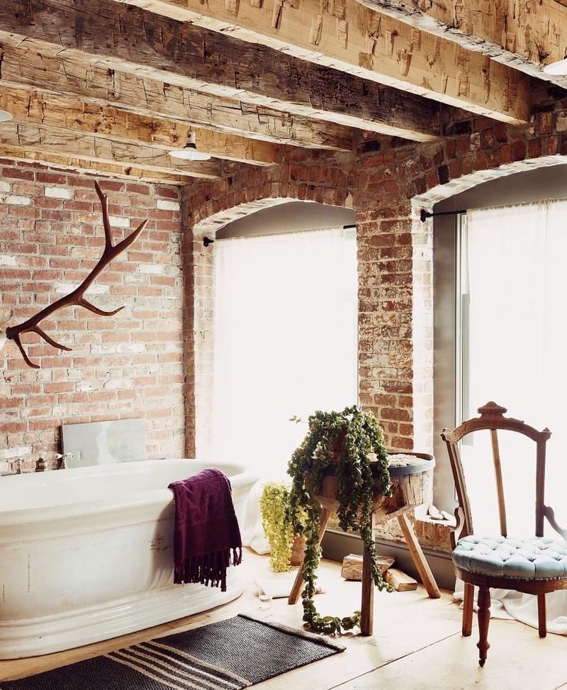 Rustic bathroom with brick wall