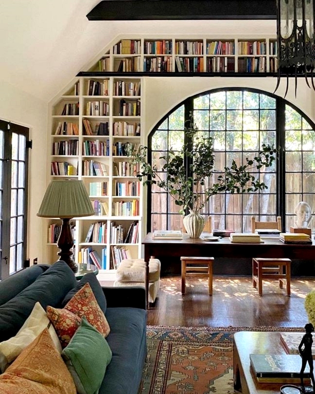 Historic Landmark living room with large built-in Bookshelves around window