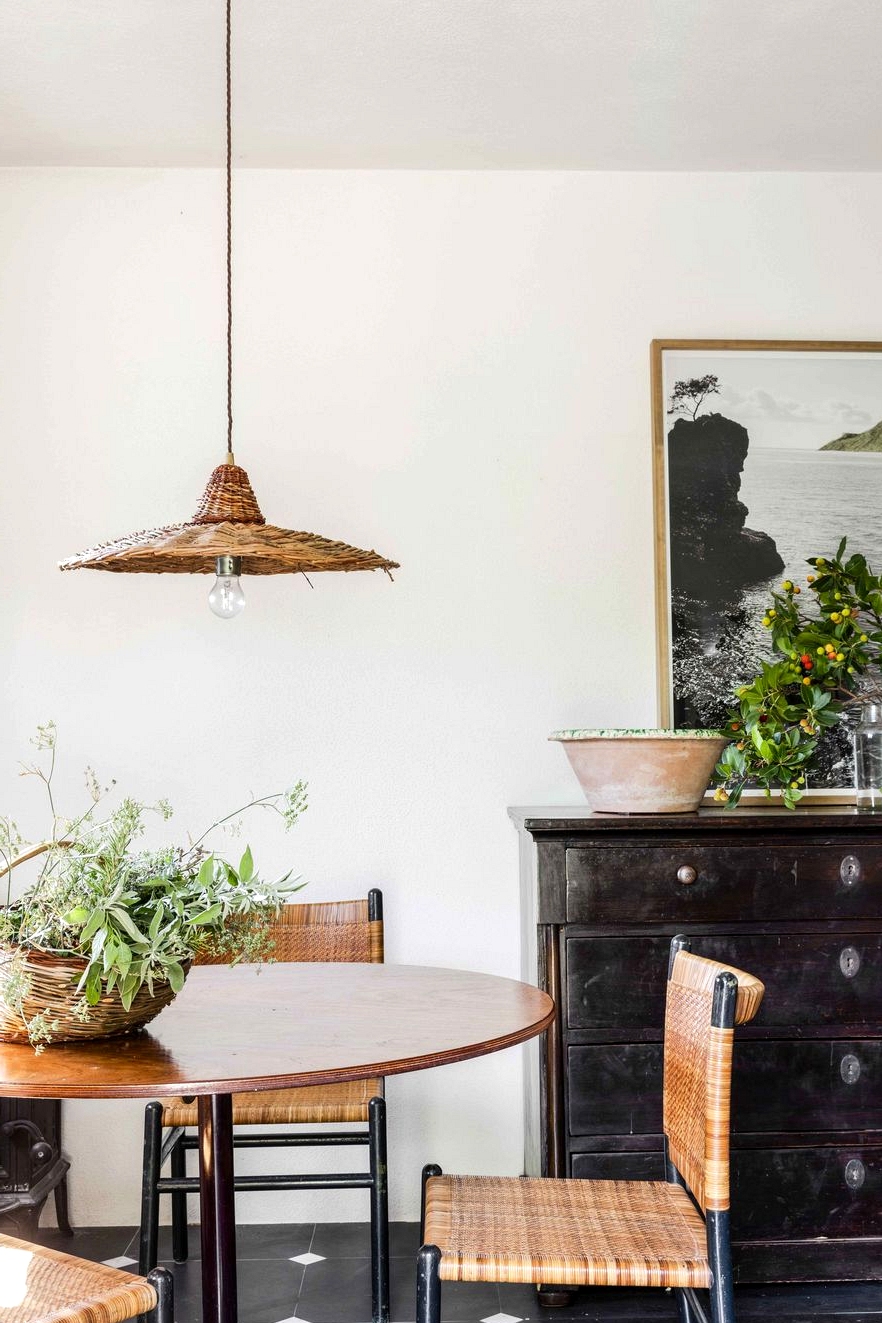 mix of antiques in a small italian vacation home dining room