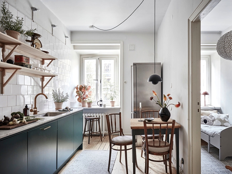 Cozy kitchen in petrol inexperienced